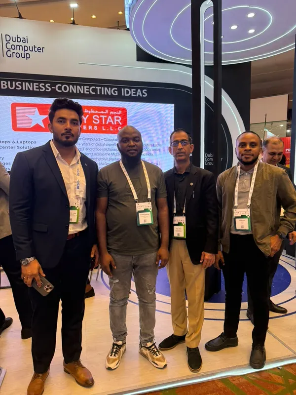 Four members of the team together at an exhibition stand